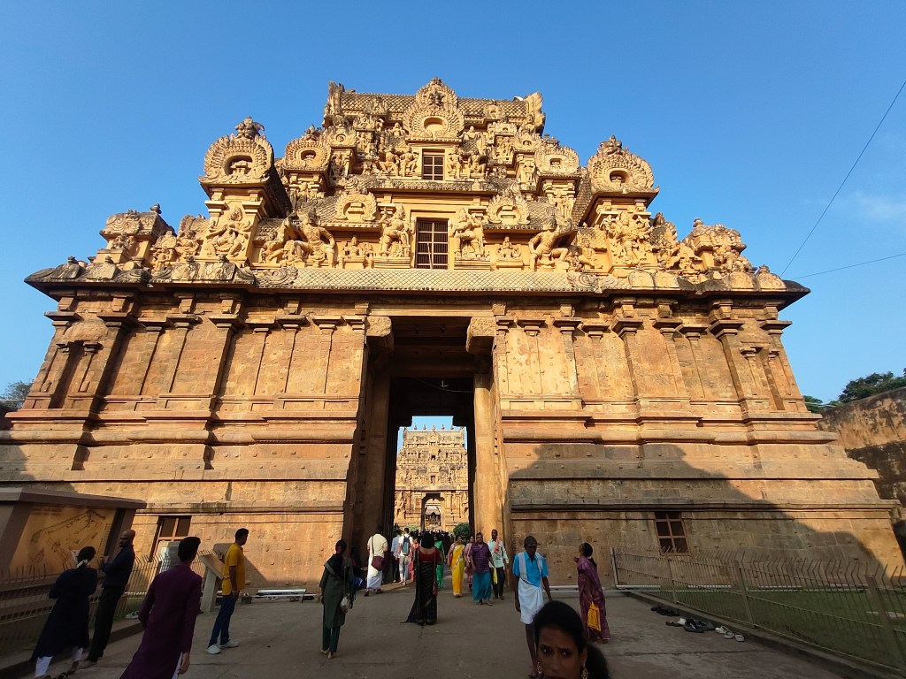 Visitors passing through Keralanthakan Thiruvasal, the main gopuram entrance of Brihadeeswara Temple, Thanjavur